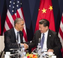 ' US and China commit to climate deal '