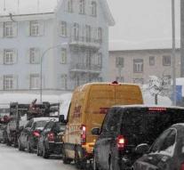 VIPs in Davos let limousines stand by snow