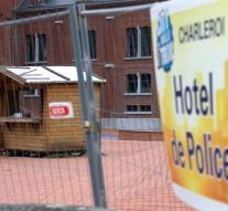 'Wounded cops Charleroi from coma'