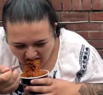 Young woman in hospital after eating extremely spicy noodle soup