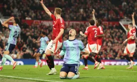 Arsenal Title Hopes Dim After Draw at Man Utd