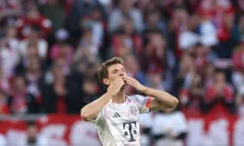 Thomas Müller Bids Farewell to Bayern Munich as Bundesliga's Final Day Drama Unfolds
