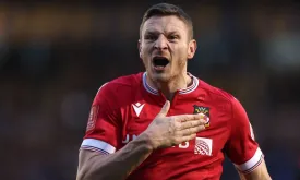Wrexham's Paul Mullin Chooses Loan Move to Wigan, Says Coach Phil Parkinson