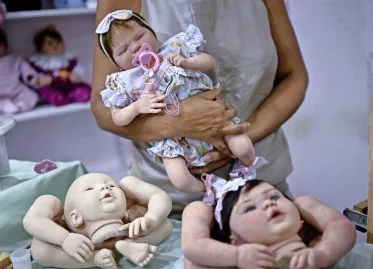 Brazil's Obsession with Lifelike 'Reborn' Baby Dolls Sparks Political Debate