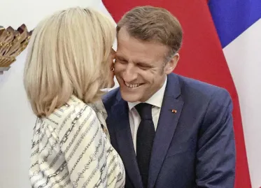 Emmanuel Macron and Wife Brigitte Display Affection Amid Rumors of Conflict