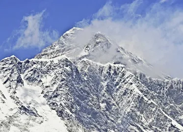 Former Marine Reaches Mount Everest Summit After 13,000km Triathlon