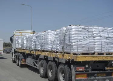 Israel Allows 100 Trucks of Aid into Gaza Amid Rising Tensions