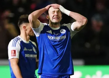 Macclesfield FC's FA Cup Run Ends with Own Goal Against Brentford