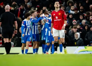 Manchester United Suffers Early FA Cup Exit Amidst Managerial Crisis