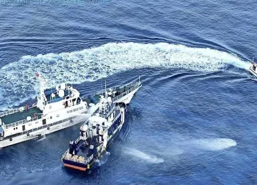 Tensions Rise as 'Aggressive' China Deploys Water Cannon in Disputed South China Sea Island