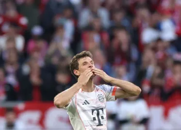 Thomas Müller Bids Farewell to Bayern Munich as Bundesliga's Final Day Drama Unfolds