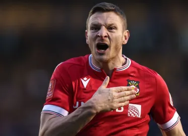 Wrexham's Paul Mullin Chooses Loan Move to Wigan, Says Coach Phil Parkinson