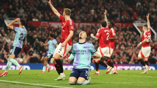 Arsenal Title Hopes Dim After Draw at Man Utd