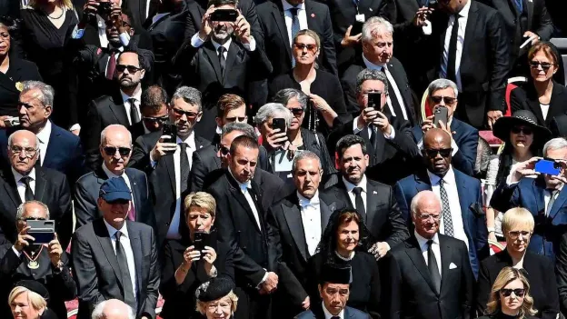 Controversy as World Leaders Reach for Phones During Pope's Funeral