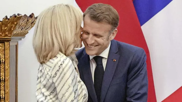 Emmanuel Macron and Wife Brigitte Display Affection Amid Rumors of Conflict
