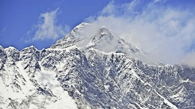 Former Marine Reaches Mount Everest Summit After 13,000km Triathlon
