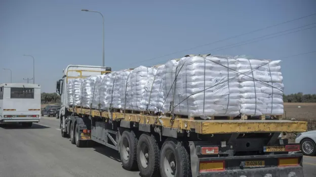 Israel Allows 100 Trucks of Aid into Gaza Amid Rising Tensions