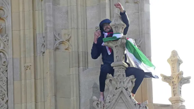 Man Climbs Big Ben with Palestinian Flag
