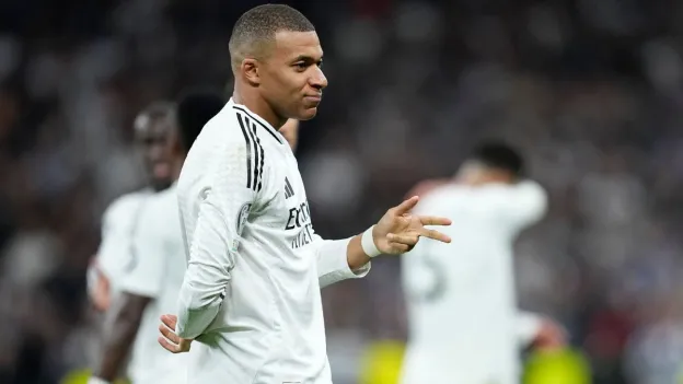 Mbappé Hat-Trick Sends Real Madrid to Champions League Round of 16