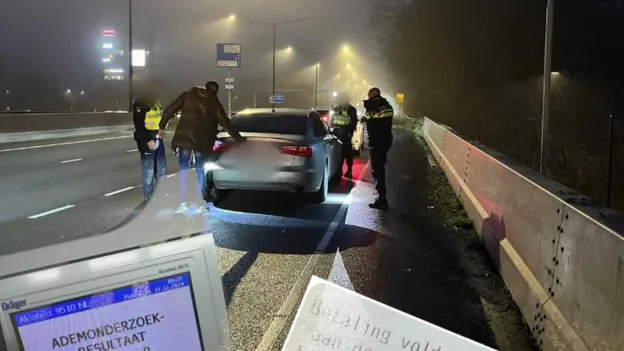 Police arrests drunk driver from Belgium with blood in car door on highway