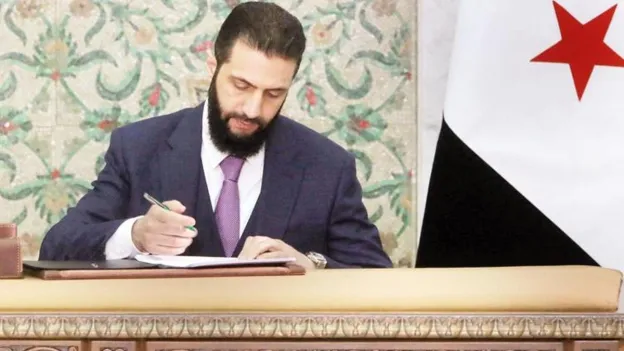 Syria Adopts Temporary Constitution in Damascus