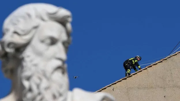 Vatican Workers Install Chimney on Sistine Chapel for Papal Conclave